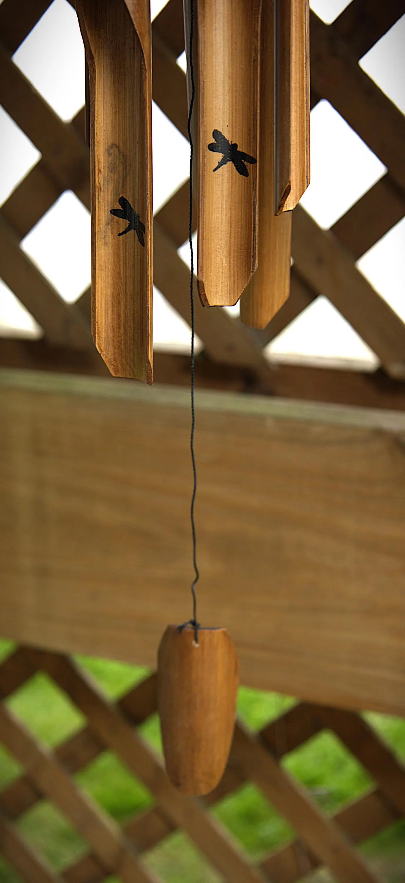 Handcrafted bamboo dragonfly wind chime with a rustic nature-inspired design, creating soothing bamboo tones for outdoor gardens, patios, porches, balconies, meditation spaces, and cottage-style landscaping. Perfect as a unique dragonfly gift, memorial garden decoration, or peaceful backyard accent.